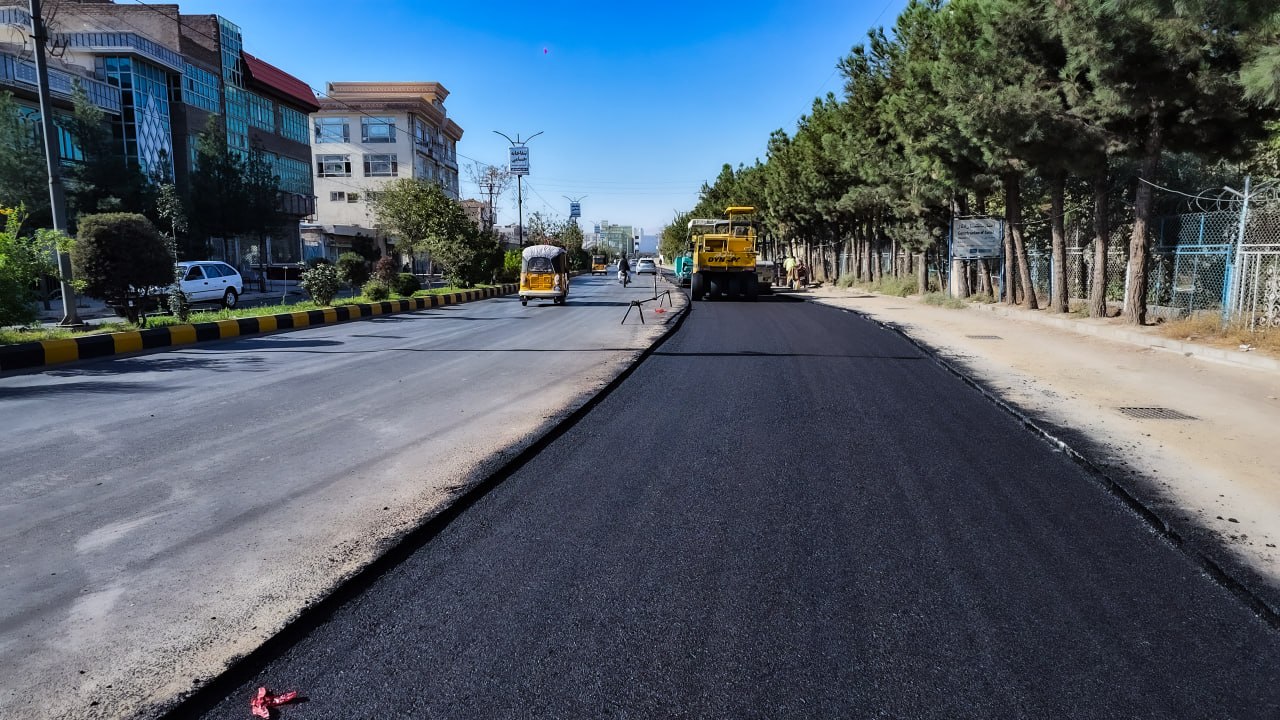 First-Layer Asphalt Paving Work Underway Along the Eastern Lane of the Main Road from Mustofiat to Bagh-e-Murad Intersection in District 8 of Herat City.